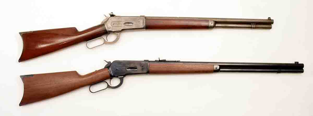 A Winchester Model 1886 .40-82 with a 20-inch barrel is shown above a Winchester/Miroku .45-70.